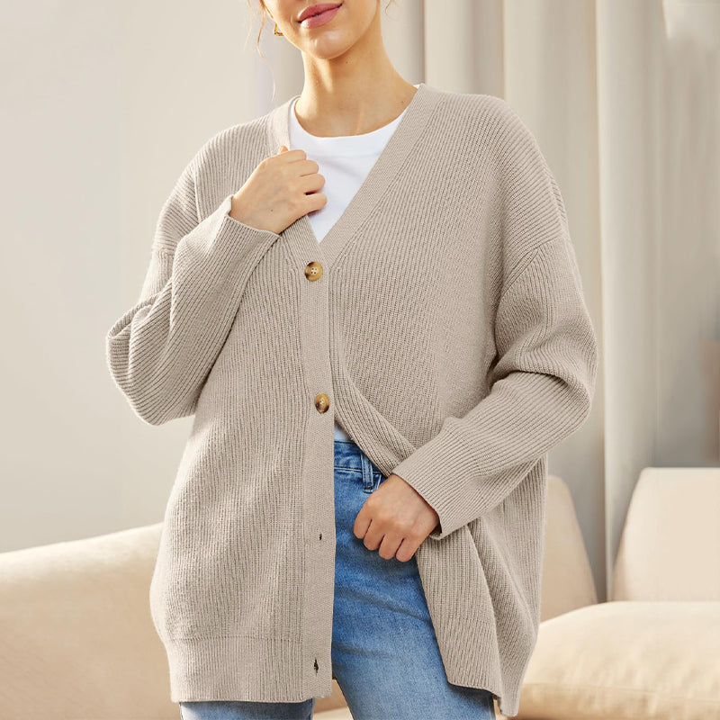 Langermet genser cardigan i ensfarget design, et must-have for kvinner.
