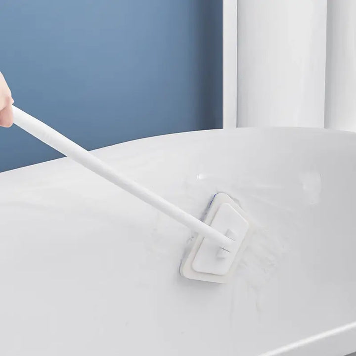 Detaljert bilde av roterende 2-i-1 rengjøringsbørste for dyprens av fuger og overflater på badet. Optimal hjemmehygiene.
