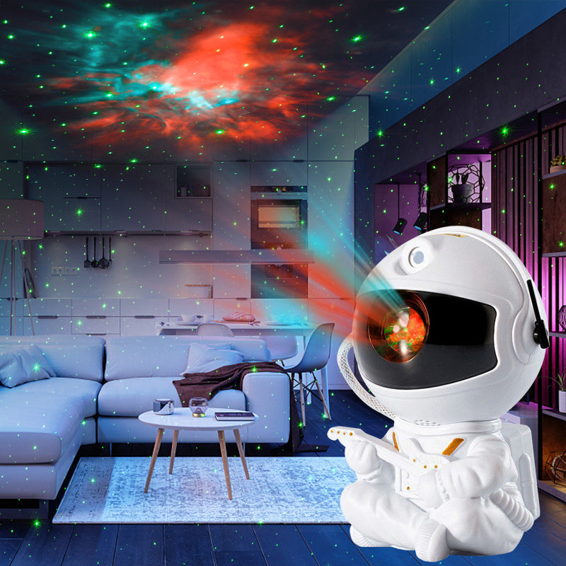Astronaut nattlys plassert på nattbord, skaper en drømmende atmosfære.