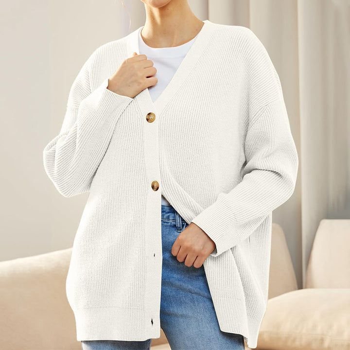 Ensfarget cardigan for kvinner, casual og komfortabel, med et snev av eleganse.