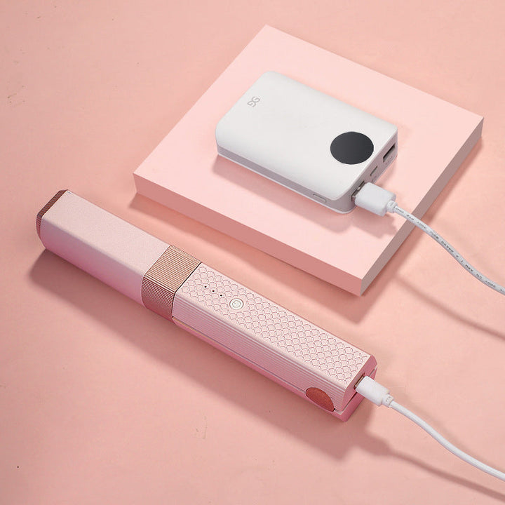 Allsidig bærbar USB krølltang, skaper volum og definerte krøller uten ledning.