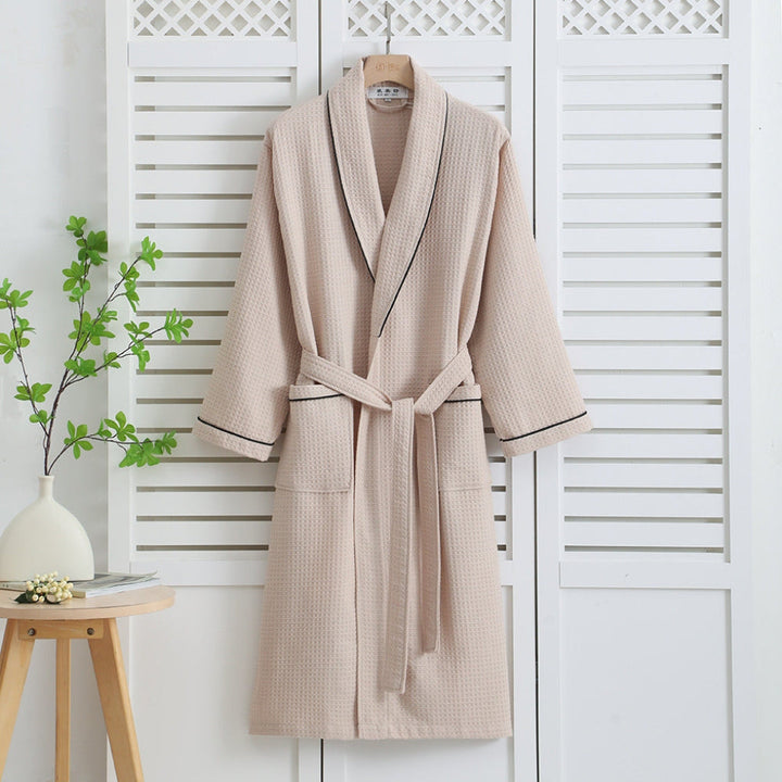 Myk og lettvekt unisex badekåpe i bomull med klassisk kimono-design. Komfortabel vaffelmorgenkåpe.