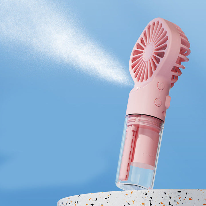Personlig kjølevifte med fuktspray. Ergonomisk designet håndholdt vifte for maksimal komfort og kjøling.