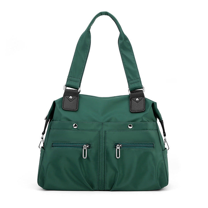 Vanntett nylon skulderveske for kvinner. Ideell laptopveske, reiseveske og arbeidsveske.