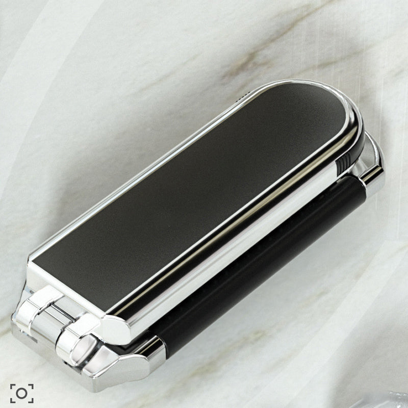 Stilren sammenleggbar hårbørste med speil. Robust design for daglig hårpleie og reisebruk.