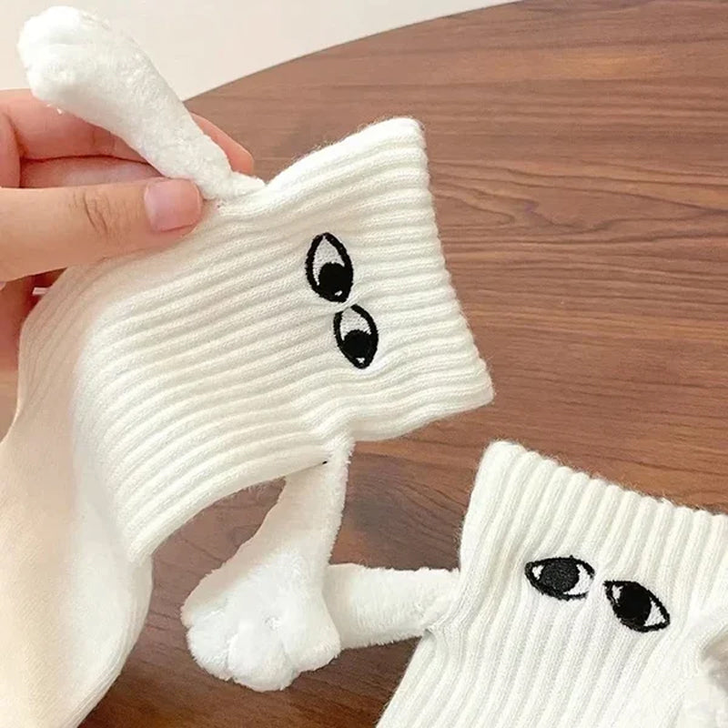 Hånd i hånd magnetiske sokker i myk polyester, perfekt for venner og par som matcher stil.