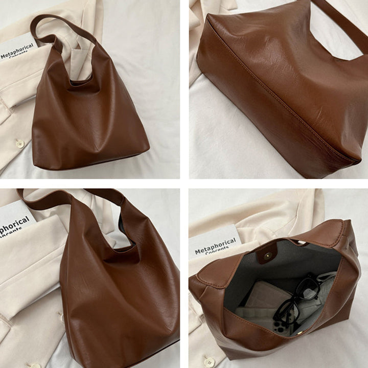 Bakside av elegant brun dameskulderveske, ren design, perfekt for hverdag og fest.