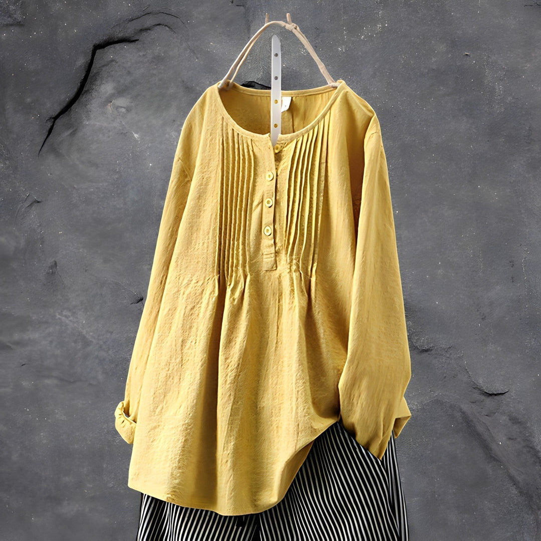 Fargerik løs damebluse, håndlaget for komfort og stil. En allsidig bluse for elegant hverdagsstil.