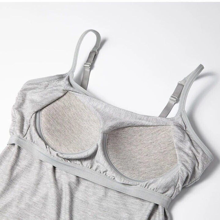Pustende løstsittende tank top for damer med innebygd BH. Ideell for varme dager og aktivitet.