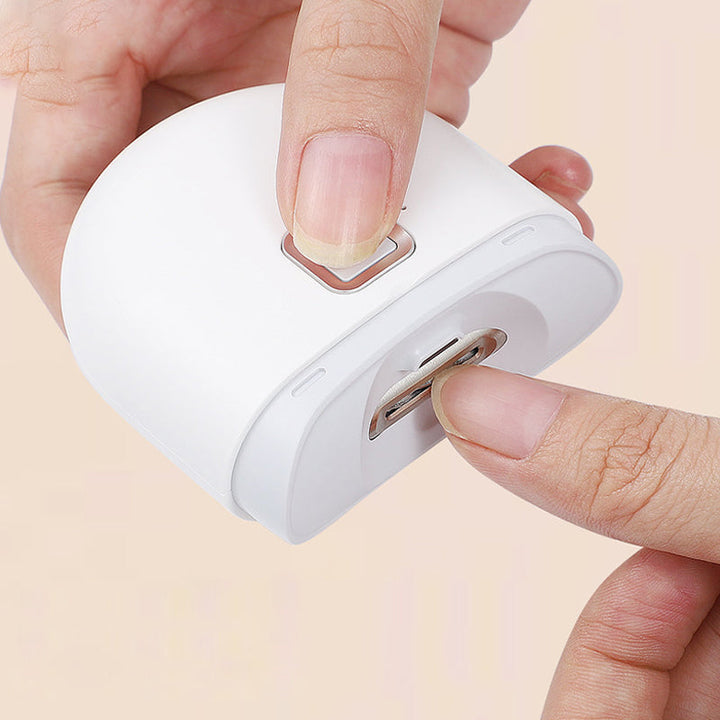 Kompakt og bærbar elektrisk negleklipper i moderne design, perfekt for enkel og automatisk neglepleie på farten.