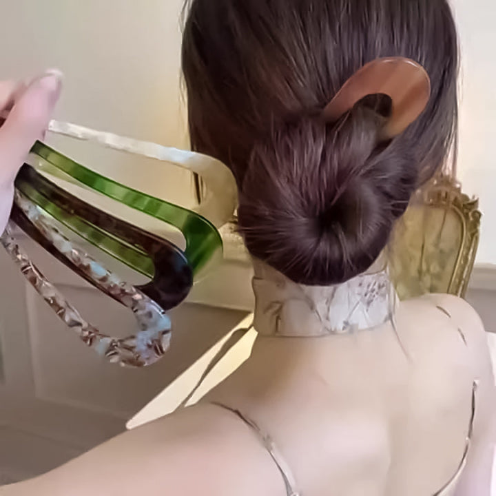 Enkel og elegant U-hårnål for en profesjonell hårstyling, et must-have tilbehør.