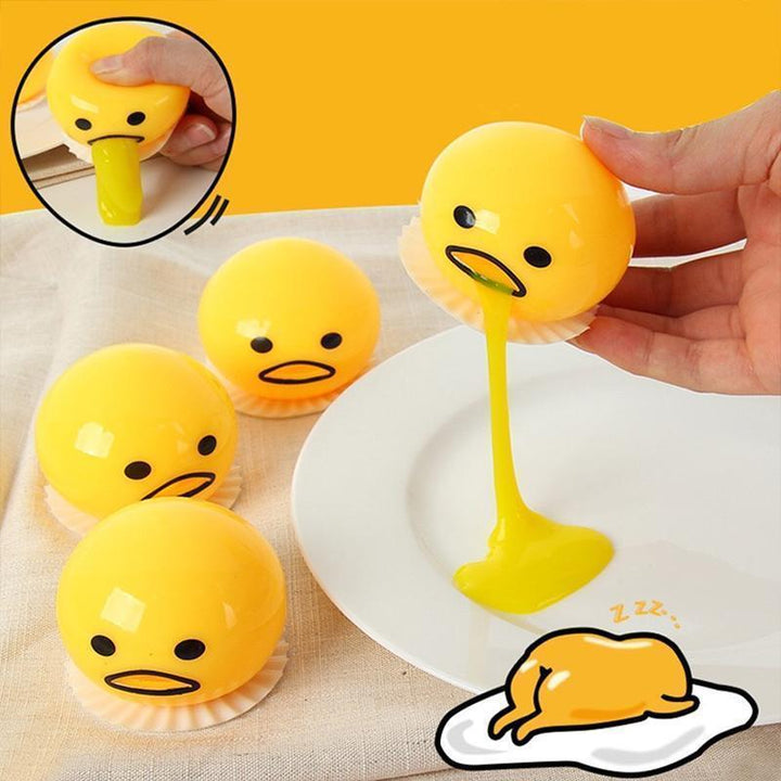 Gul eggeplomme stressball som klemmes for stresslindring. Morsom antistressleke for barn og voksne.