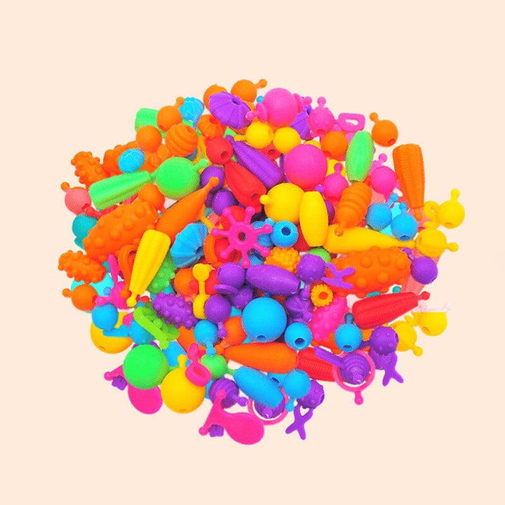 Ideelt gavetips: Smykkelagesett for barn. Fremmer kreativitet og motorikk med DIY-perler.