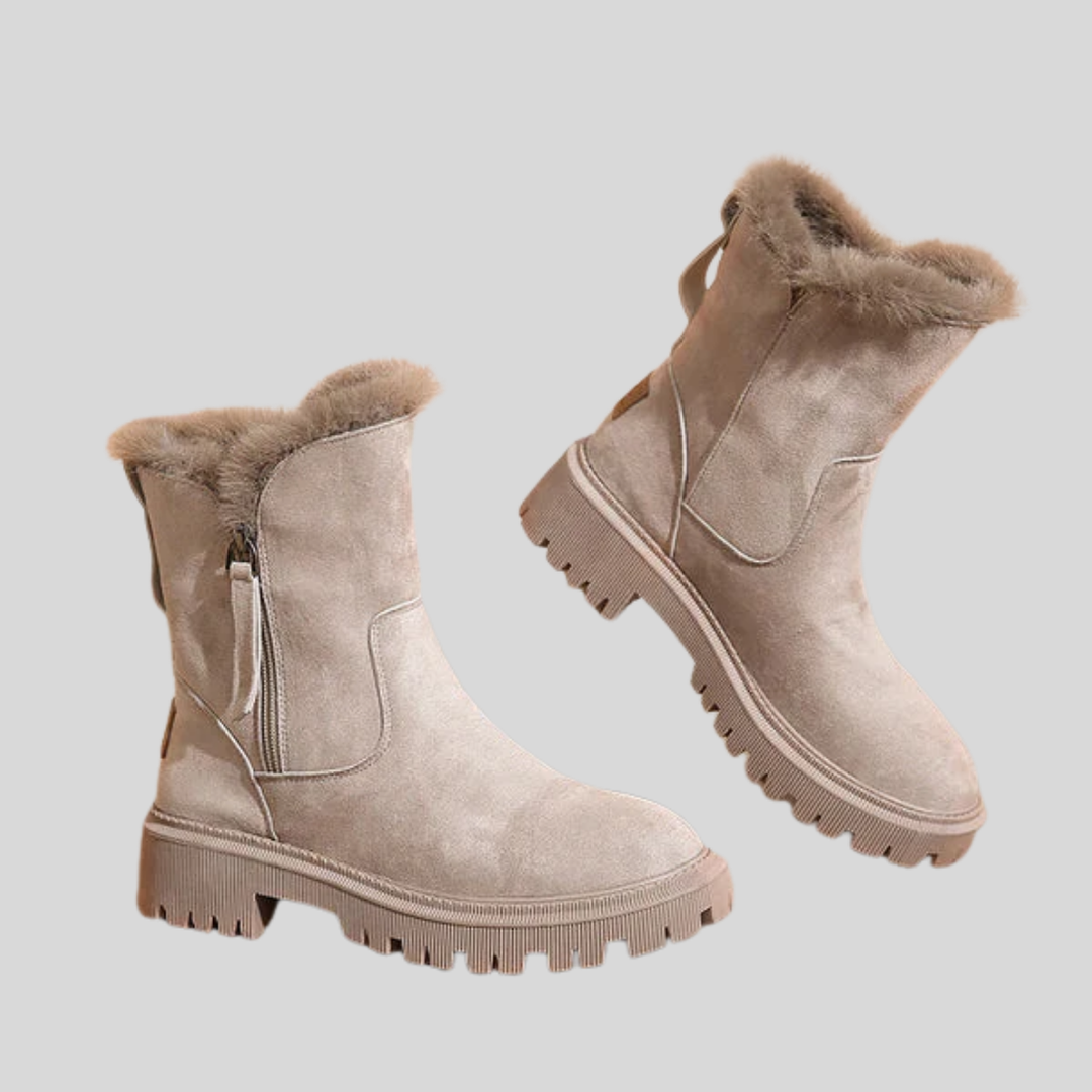 Kvinners isolerte termiske vinterstøvler i beige og svart med glidelås. Perfekt for varme og grep i snø.