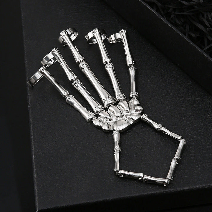 Stilig unisex metall skallearmbånd. Passer til punk og gotisk fashion, et must-have tilbehør.