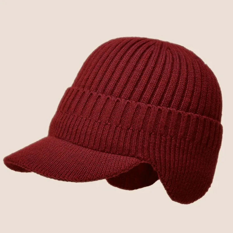 Robust strikket unisex vinterlue med ørebeskyttelse, designet for langvarig bruk.