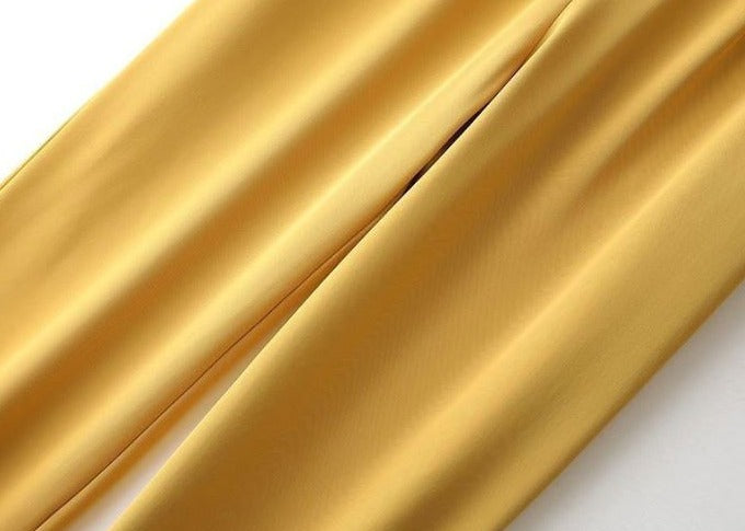 Damebukser med brede ben, komfortabel og løs passform. Pustende polyester for sommerhverdagsbruk.