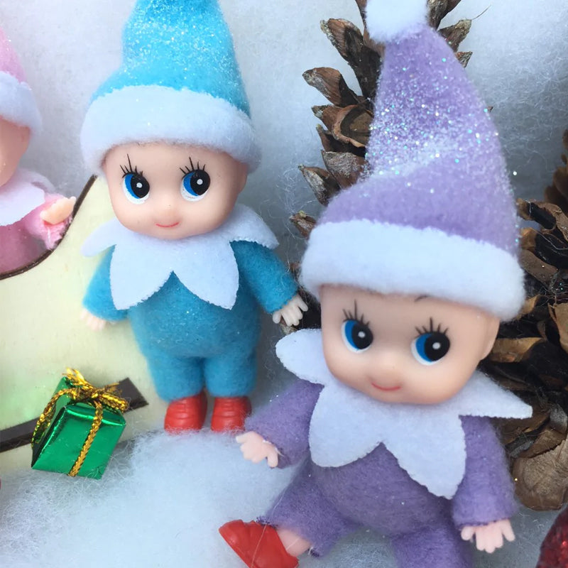 Lekende julebaby alvedukke, en herlig babyleke og julegaveide.