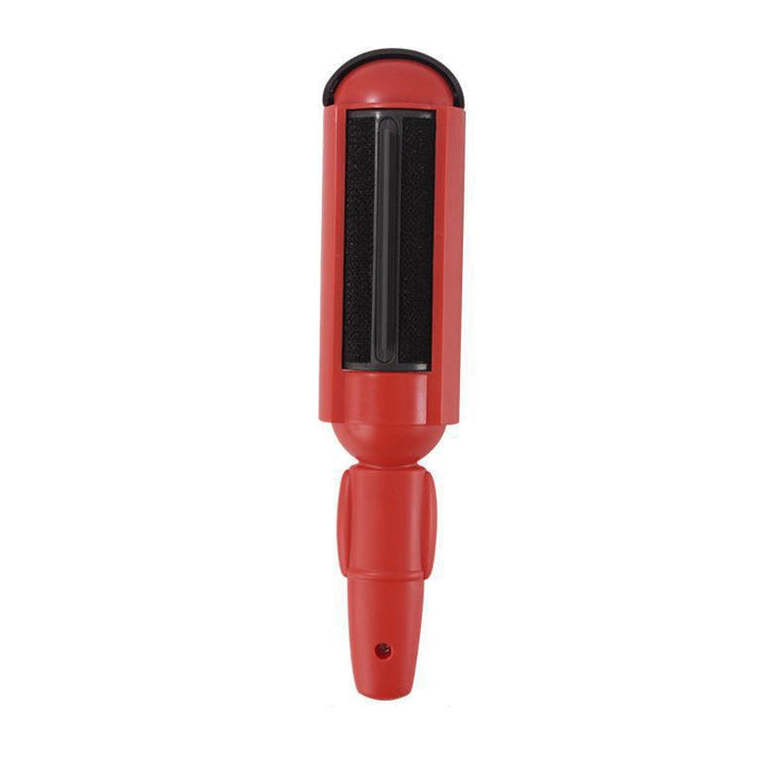 Grønn dyrehårfjerner, ergonomisk design for enkel bruk på alle møbeloverflater.