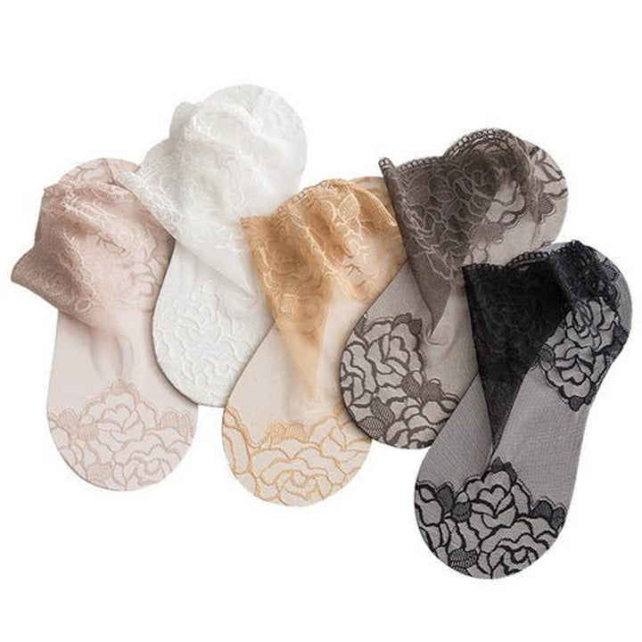 Mote blondesokker med rosedesign for kvinner, et elegant og pustende tilbehør.