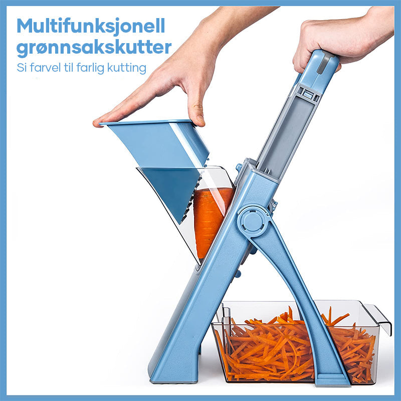Alle delene til en multifunksjonell grønnsakskutter lagt ut. Inkluderer mandolin og diverse kutteblader.