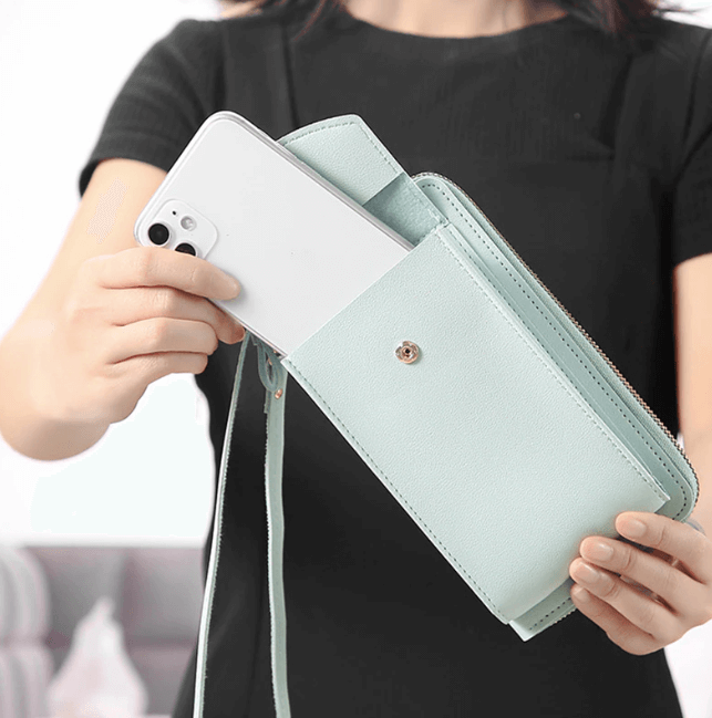 Reiseveske i PU-skinn: praktisk damemote crossbody med romslig design.