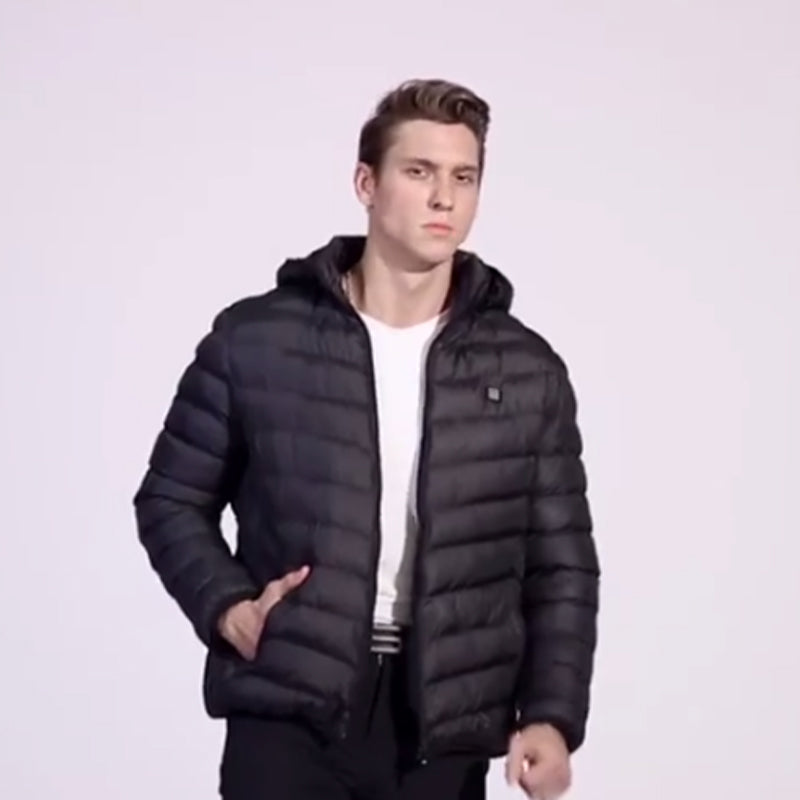 Svart unisex oppvarmet pufferjakke. Perfekt vinterjakke for utendørsaktiviteter, gir optimal varme og komfort.