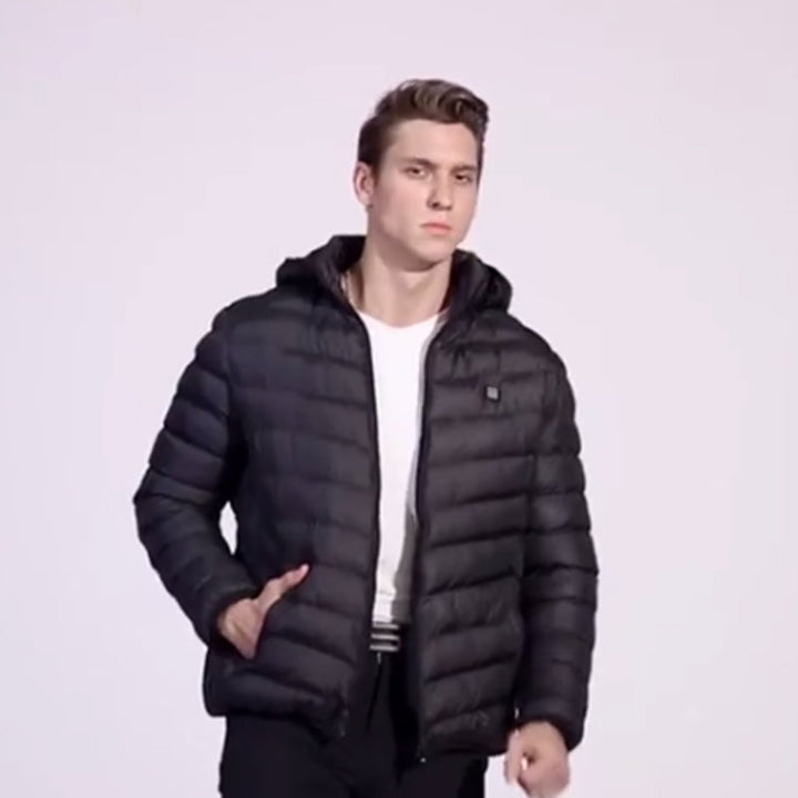 Svart unisex oppvarmet pufferjakke. Perfekt vinterjakke for utendørsaktiviteter, gir optimal varme og komfort.