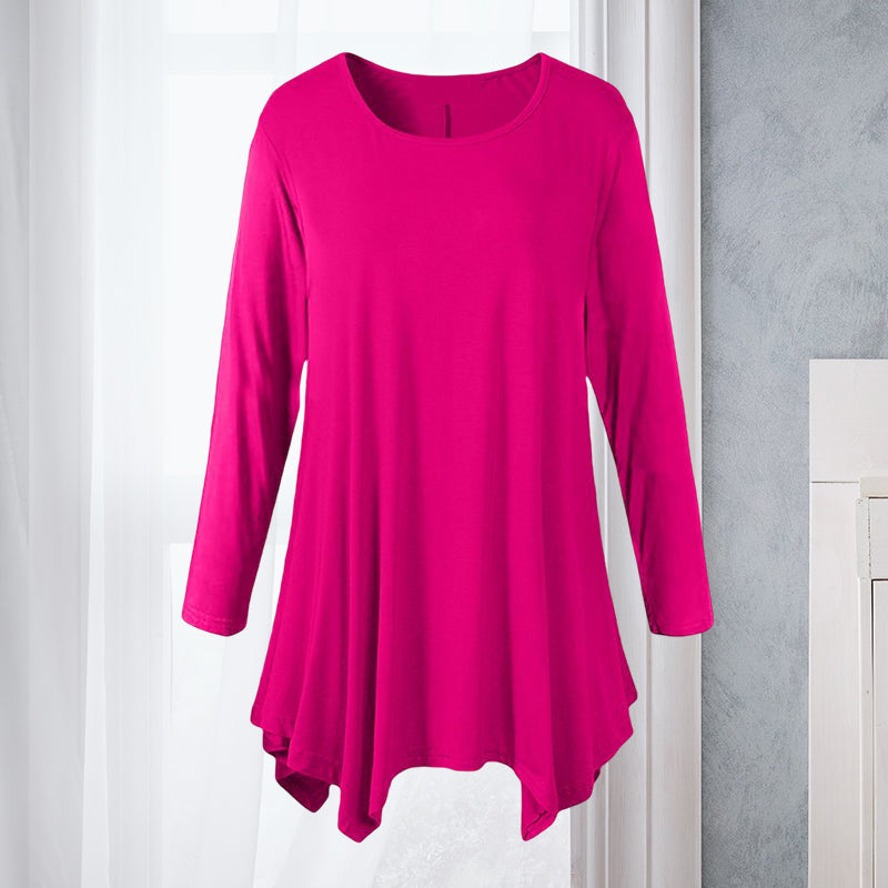 Klassisk ensfarget langermet bluse til dame med rund hals. Essensielt plagg for en komfortabel garderobe.