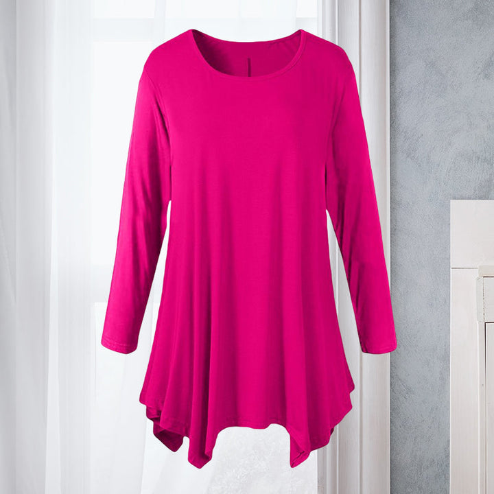 Klassisk ensfarget langermet bluse til dame med rund hals. Essensielt plagg for en komfortabel garderobe.