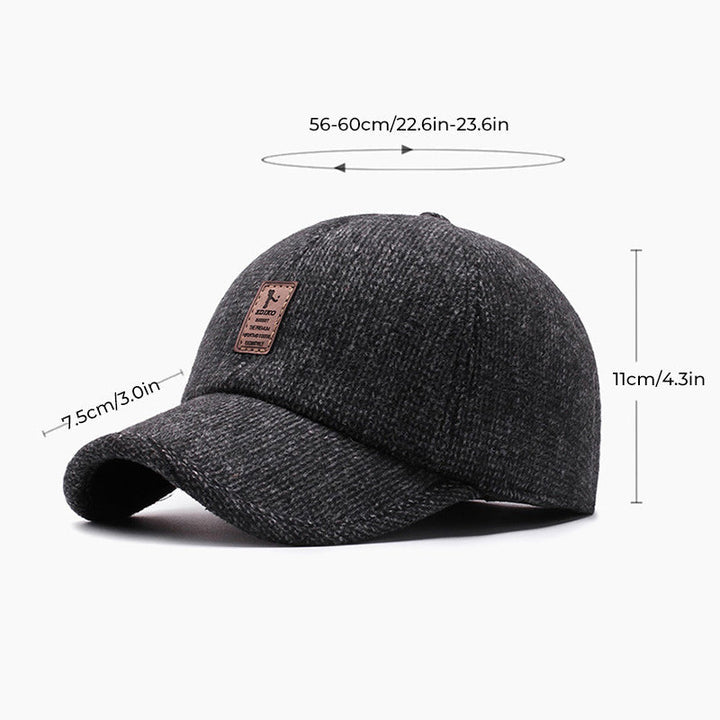 Vintercaps med øreklaffer og snapback. Justerbar unisex hatt for en perfekt og varm passform. [[lstfy-media:9]]