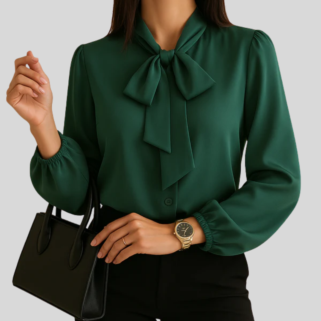 Elegant svart sløyfebluse for kvinner, langermet. Ideell for jobb, kontor eller festantrekk.