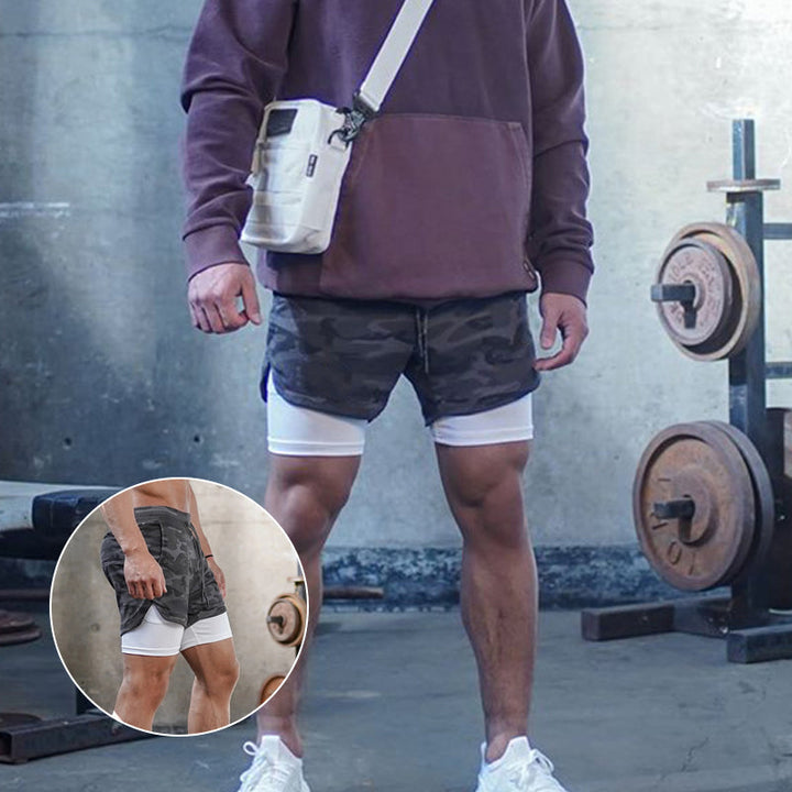 Elastisk linning på herre 2-i-1 treningsshorts for sikker passform og komfort.