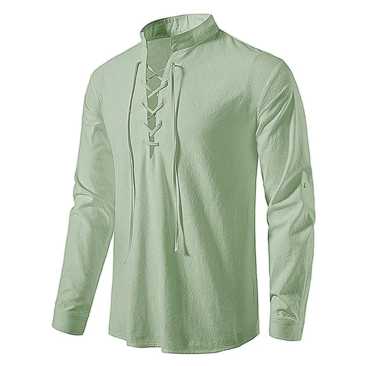 Komfortabel bomullsskjorte for menn med elegant snøring. Langermet hverdagsskjorte som passer til fritid og stil.