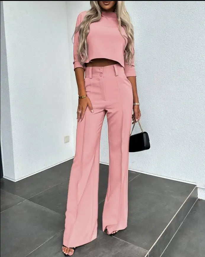 Elegant topp og matchende bukse i et 2-delt damesett. Komfortabelt og stilfullt for casual chic.