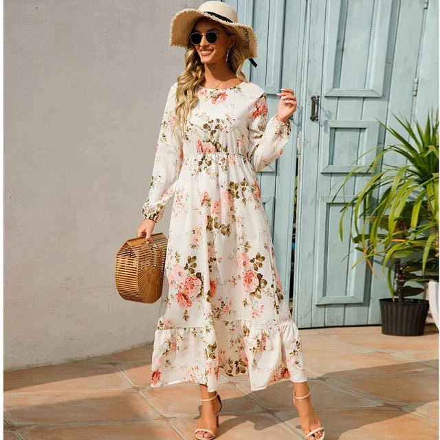 Elegant blomstret maxikjole til dame med rund hals, perfekt som behagelig sommerkjole.