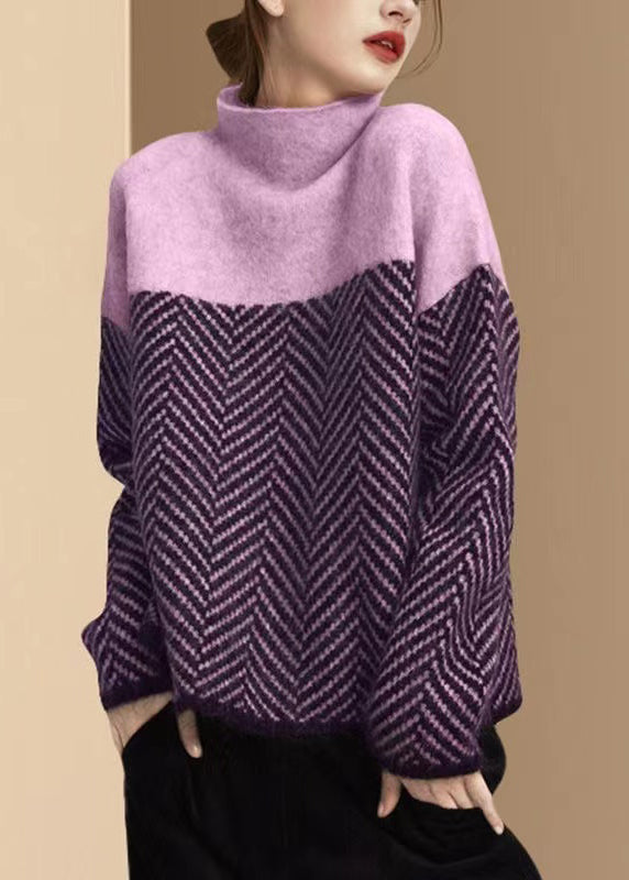 Dame rullekragengenser, strikket med lappeteppe. Perfekt for vinter og casual bruk. Myk og varm.