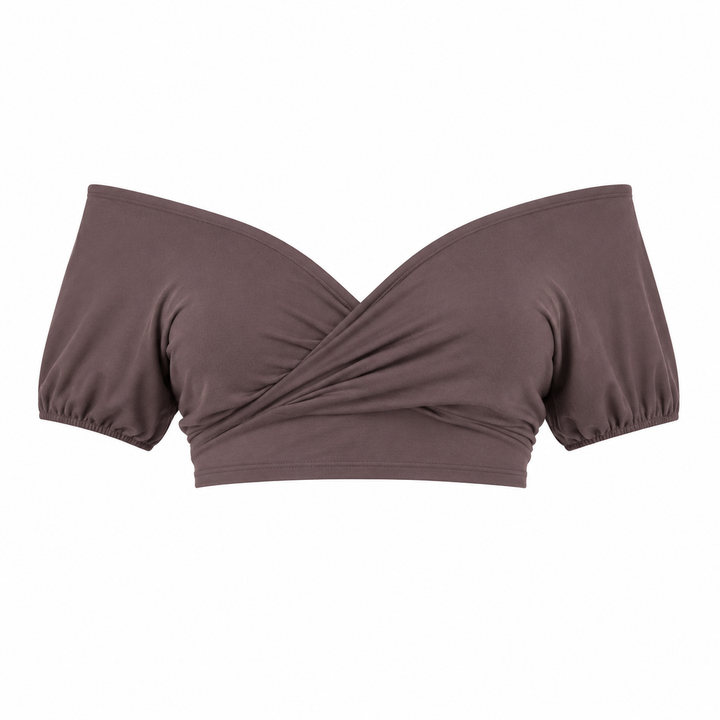 Flott off-shoulder croptop i blå med iøynefallende åpen rygg og knyting, en trendy festtopp.