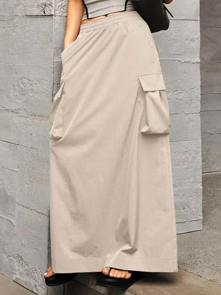 Komfortabelt maxiskjørt i cargo-stil for dame, med funksjonelle lommer. Perfekt for sommer og fritid.