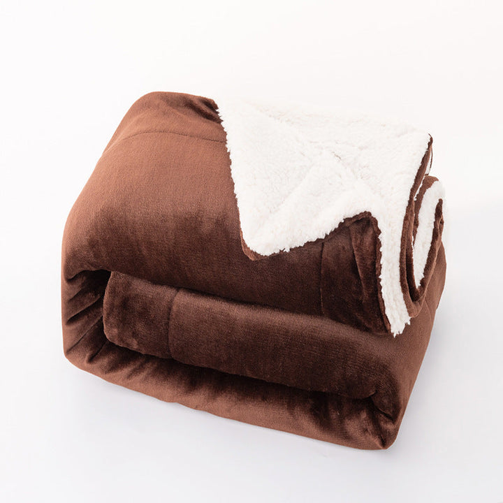 Mykt og varmt mikrofiberteppe for damer. Vendbart koseteppe, perfekt for avslapning og hygge på sofaen.