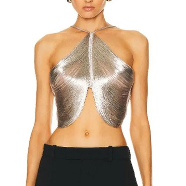 Dame halterneck festtopp i metallisk stoff med korslagt front. Trendy cropped topp for en glamorøs look.