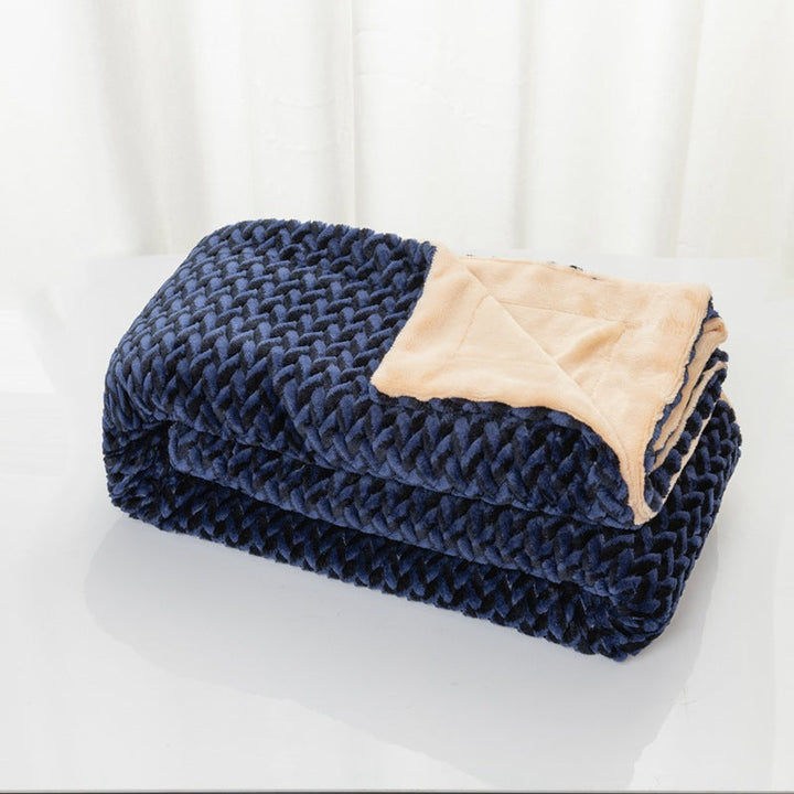 Elegant og varmt damepledd med flettemønster. Luksuriøst mikrofiber koseteppe, ideelt for sofadekor.