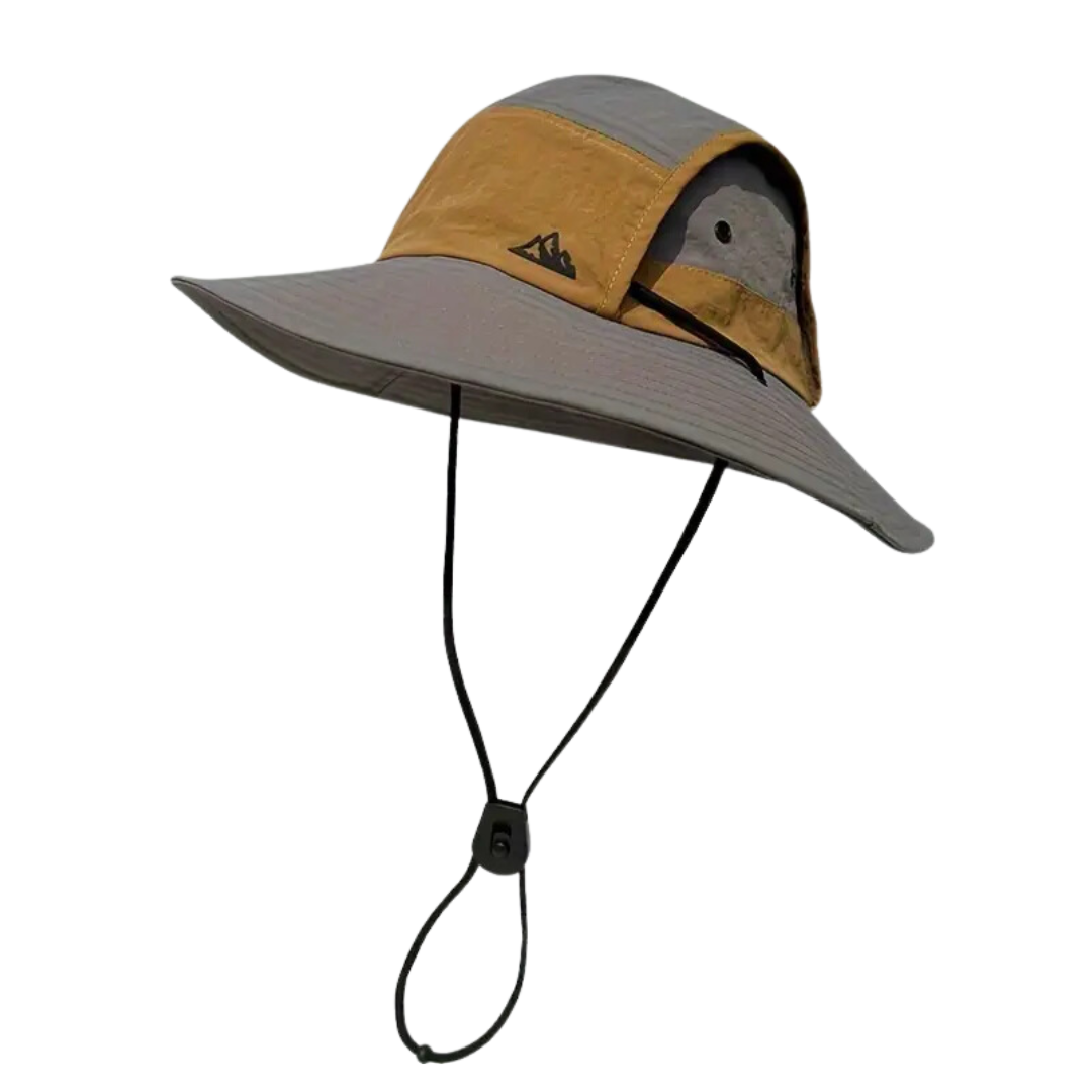 Nærbilde av pustende mesh og robust stoff på unisex UV-hatt. Komfortabel og funksjonell turbekledning.