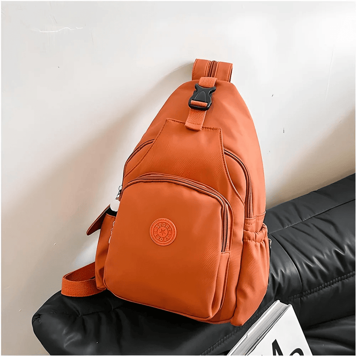 Sikker unisex reiseveske i lettvekt vanntett polyester. Konverterbar til skulderveske eller ryggsekk med tyverisikring.