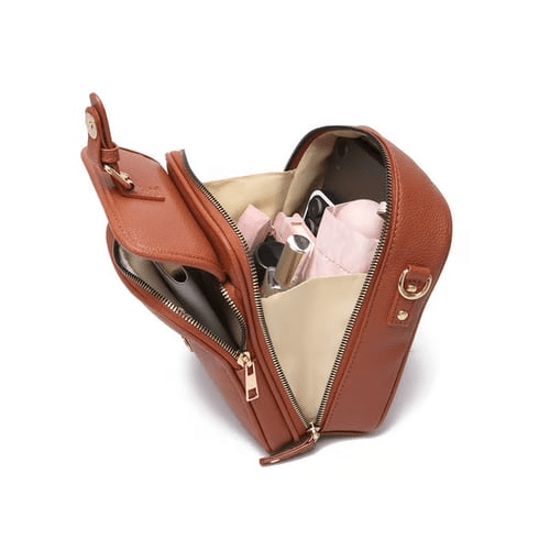 Elegant svart crossbody dameveske i skinn, perfekt for jobb og fritid.