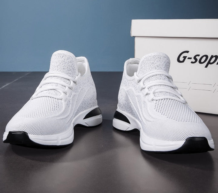 Svarte høydeøkende sneakers med skjult hæl, perfekte for en casual og stilfull look.