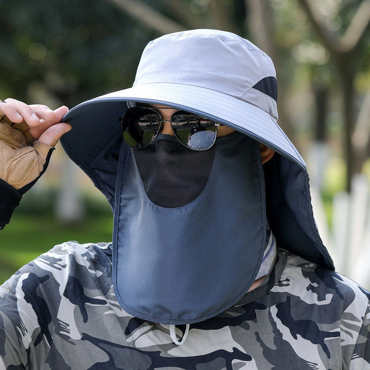 Effektiv solhatt med UV-beskyttelse, unisex design, perfekt for å unngå solbrenthet på stranden.