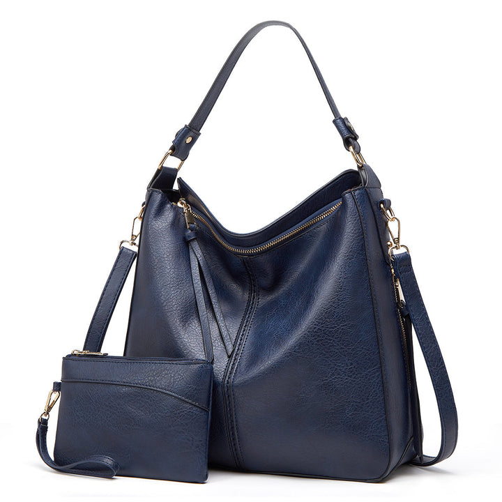 Praktisk crossbody lærdveske for kvinner, elegant design, romslig nok for mobil og lommebok.