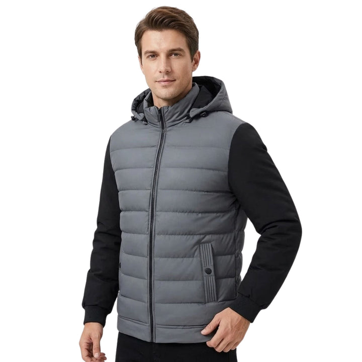 Vattert herre hettejakke i grå og svart. Komfortabel urban stil, perfekt for menn i høst/vinter. Glidelås.