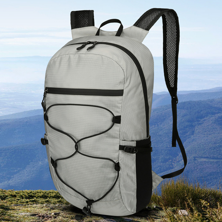 Sammenleggbar unisex ryggsekk for reise og dagstur, lettvekt og vanntett design.